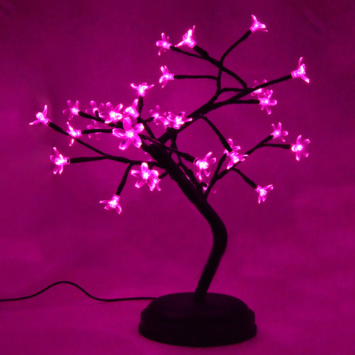 Cherry blossom table lamp with bendable Hot Pink LED lights | Dual power: Includes an extra long 9 foot USB cable for stationary use or use it anywhere wire-free with 4 AA batteries (not included) | Base features soft pads to prevent the light from slipping or scratching the surface that it is on | Provides a relaxing glow that is great as a nightlight or mood light | Lamp measures 11