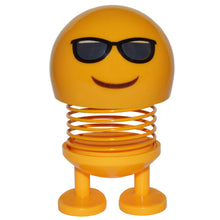 Load image into Gallery viewer, Cute emoji bobblehead with adhesive to keep it in place | Cheers you up on long car rides, at your office desk, or at home | Will not block your view, only about 4 inches in height! | Comes to life when your car is in motion, or activates from other vibrations | Mounting instructions are included on the packaging
