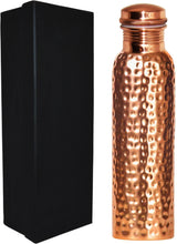 Load image into Gallery viewer, 100% pure copper drinking vessel with 30 ounce capacity, crafted by hand — superior quality Ayurvedic copper with a shimmering hammered exterior and comes packaged in an elegant gift box | Copper has strong antibacterial properties and can positively charge the water stored inside to offer a multitude of health benefits according to Ayurveda | Take it with you anywhere — it&#39;s seemless design and screw-on cap makes it leakproof, even if the bottle is held upside-down! | The metal retains the temp
